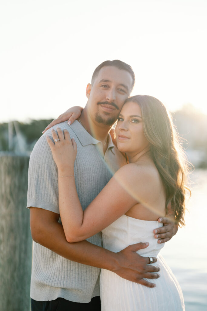 Natural and candid engagement photography in downtown Mystic Connecticut with glowy summer sunlight