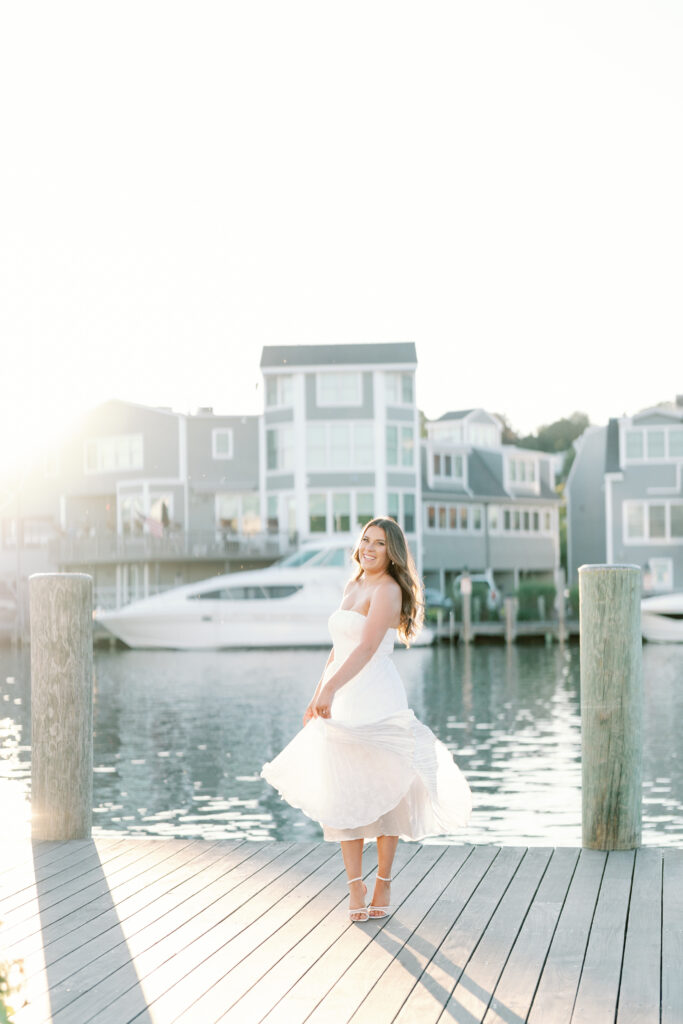 Natural and candid engagement photography in downtown Mystic Connecticut with glowy summer sunlight