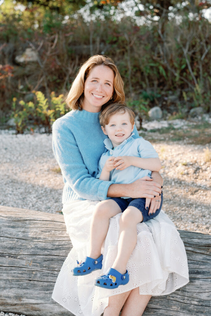 Coastal New England family portraits in Madison CT with soft breeze, sandy textures, and golden sunset light
