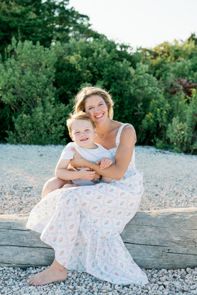 Lifestyle family photography session at Hammonasset Beach State Park featuring candid interaction and movement