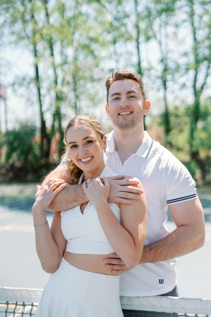 Romantic New England engagement photos of couple playing pickleball