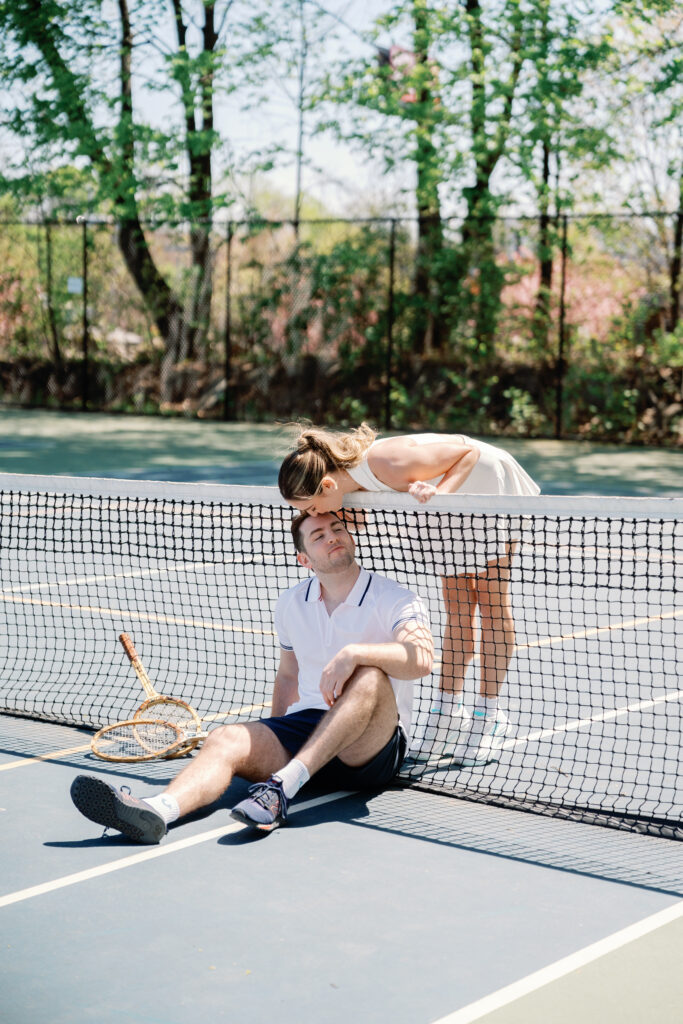 Coastal New England engagement session with couple enjoying pickleball game