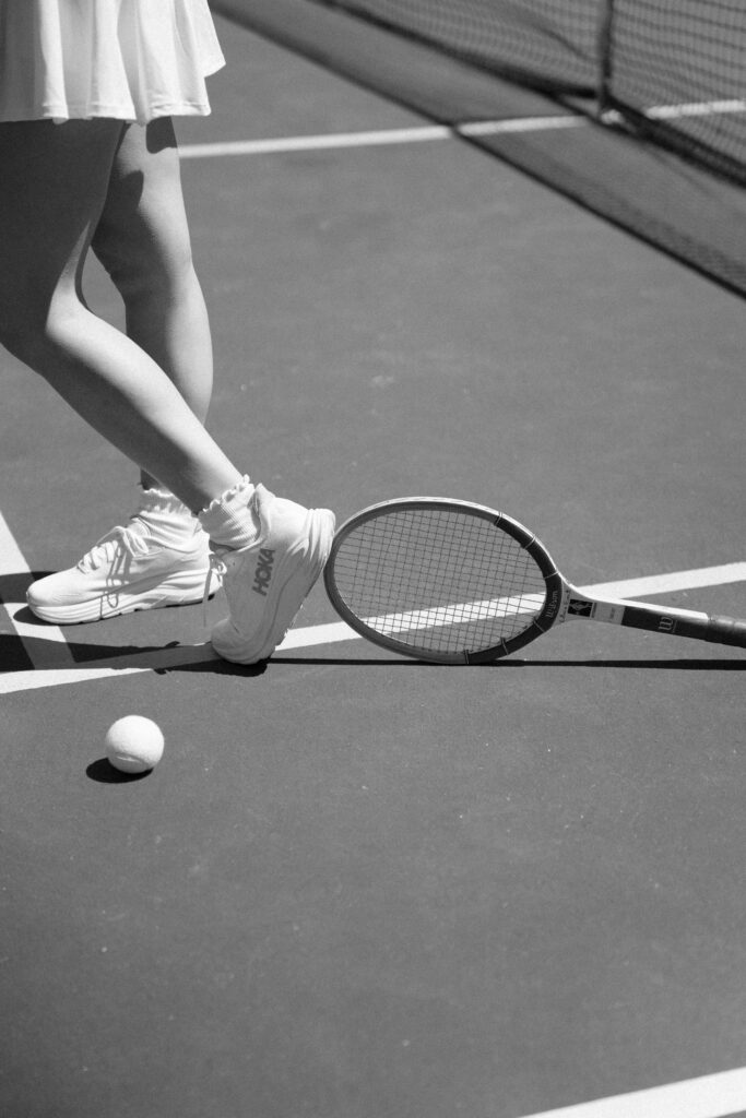 Coastal New England engagement session with couple enjoying pickleball game
