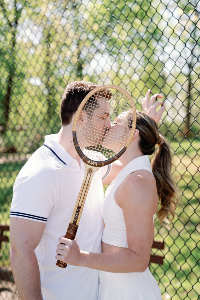 Fun and candid pickleball engagement session at Connecticut tennis and pickleball courts