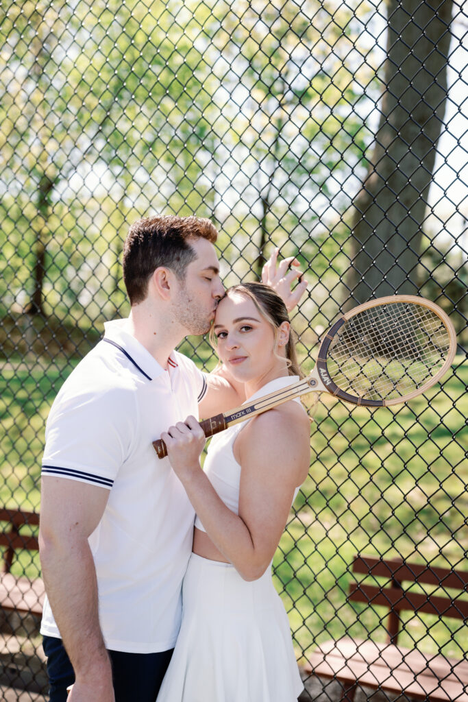 Romantic New England engagement photos of couple playing pickleball