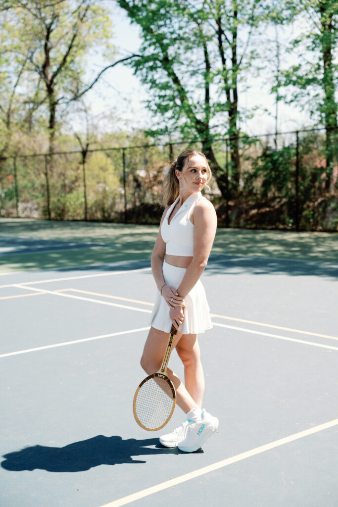 Romantic New England engagement photos of couple playing pickleball