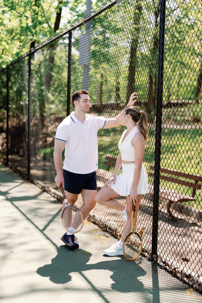 Fun and candid pickleball engagement session at Connecticut tennis and pickleball courts